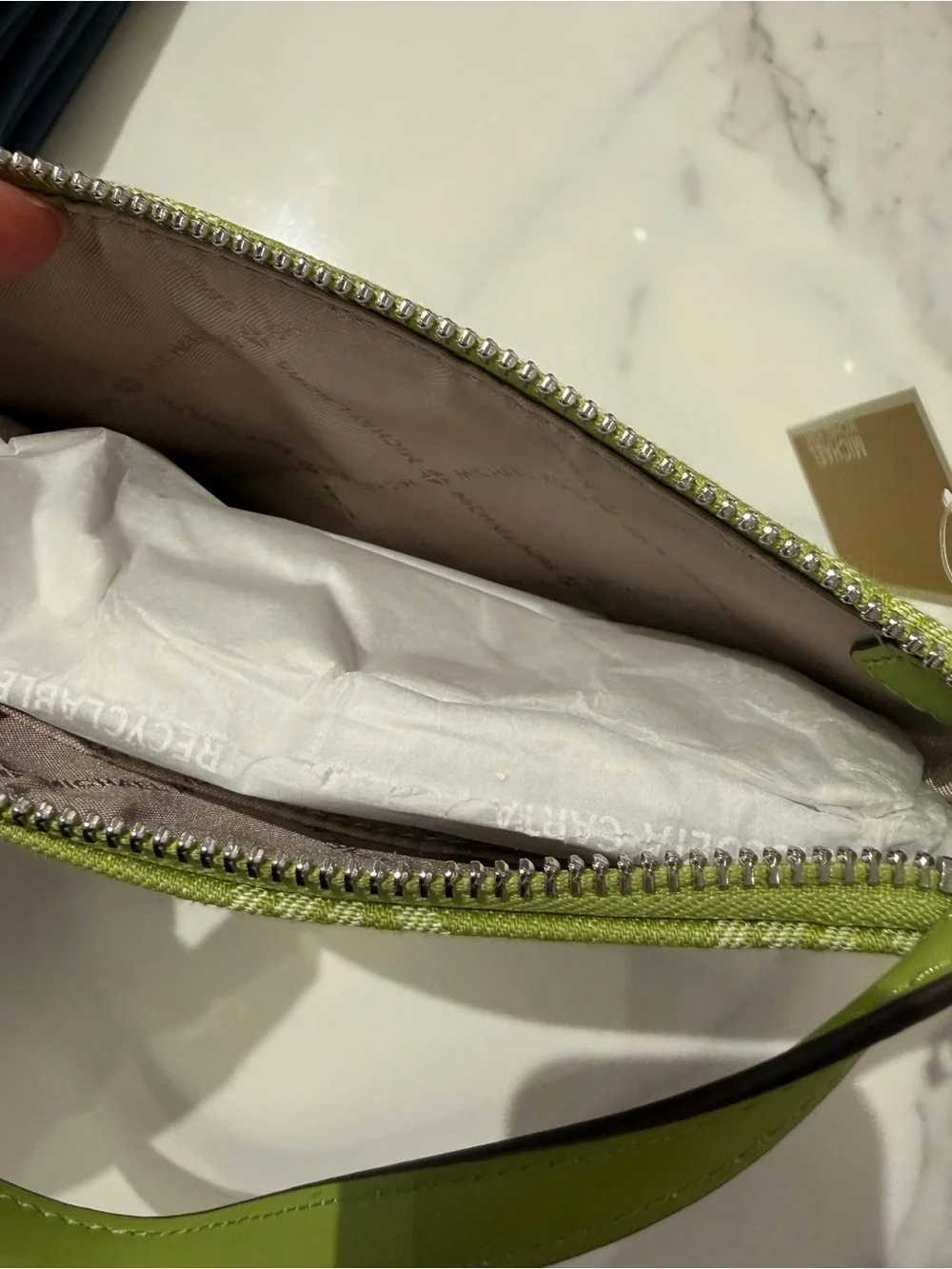 Michael Kors Signature Wristlet Clutch signature logo pink / brown/green